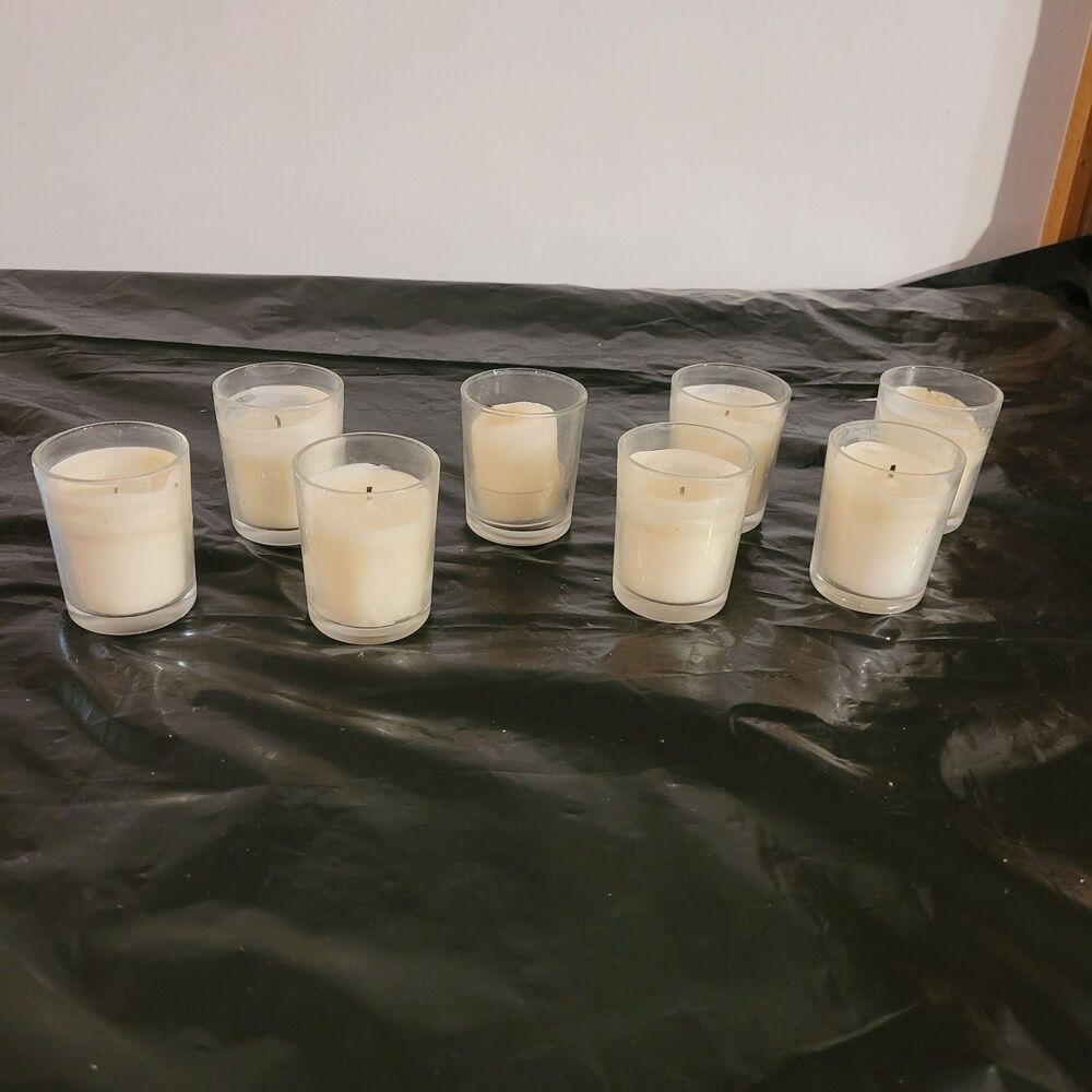 8 small votive candle holders with candles add'l white candles